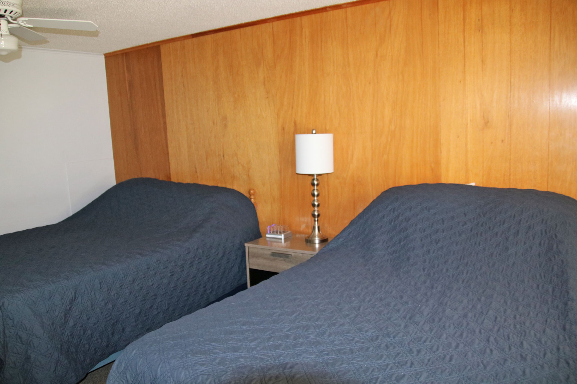 West Winds Motel & Cottages Clayton NY rooms and cottages with covered guest walkways and landscaped grounds